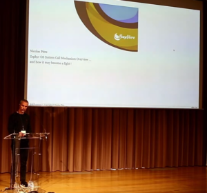 Nicolas presenting on stage