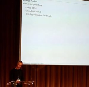 Nicolas presenting on stage